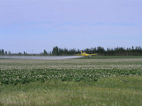 Our Crop Duster applying Ag Chemicals